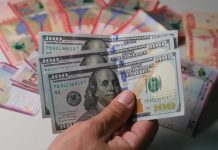 El dólar oficial sube a Bs 11,80 y acumula un alza de Bs 2,07 en un mes